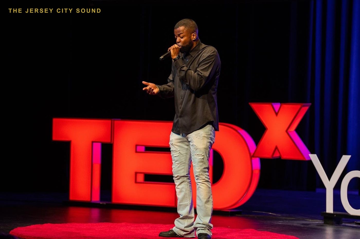 DJ DX on the TEDxYouth@RVA stage, 2022