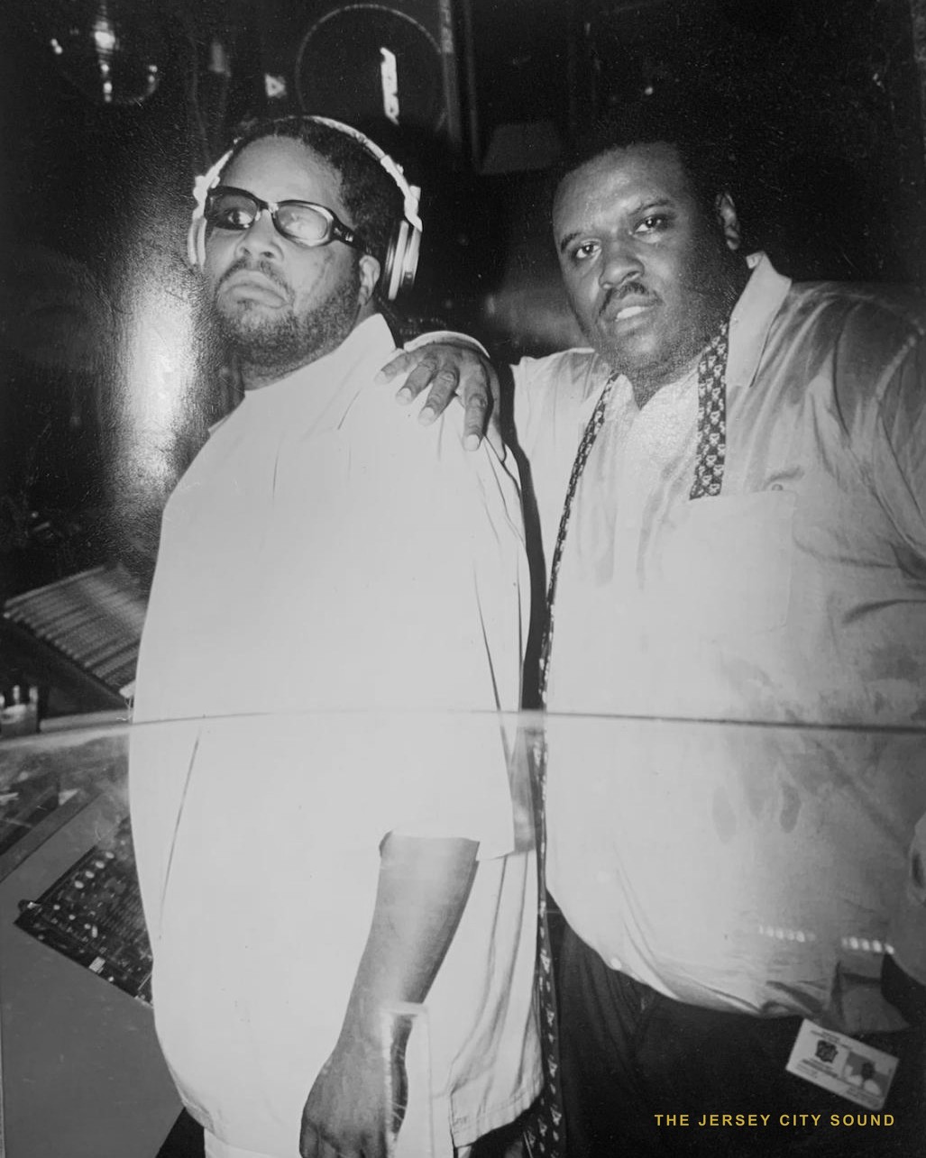 DJ Flash in headphones with DJ Wimpy Bee at Club Foxes