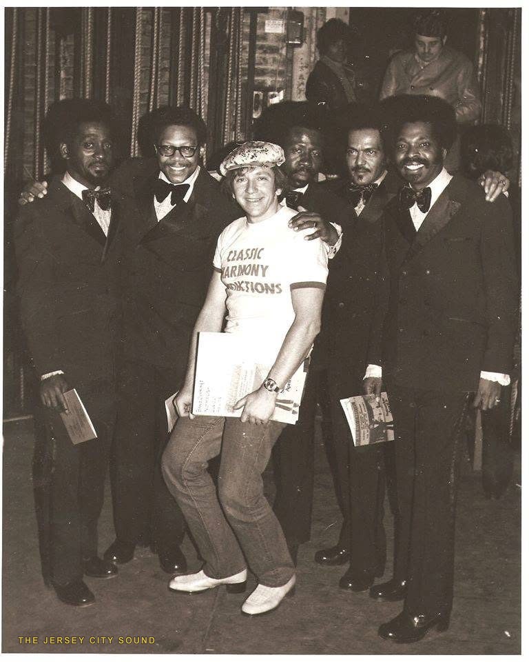 Stan Krause in a Classic Harmony Productions shirt with a vocal group