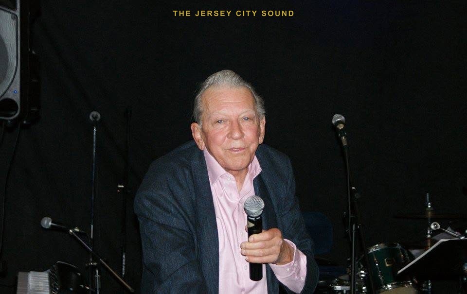 Stan Krause speaking at a vocal-harmony event